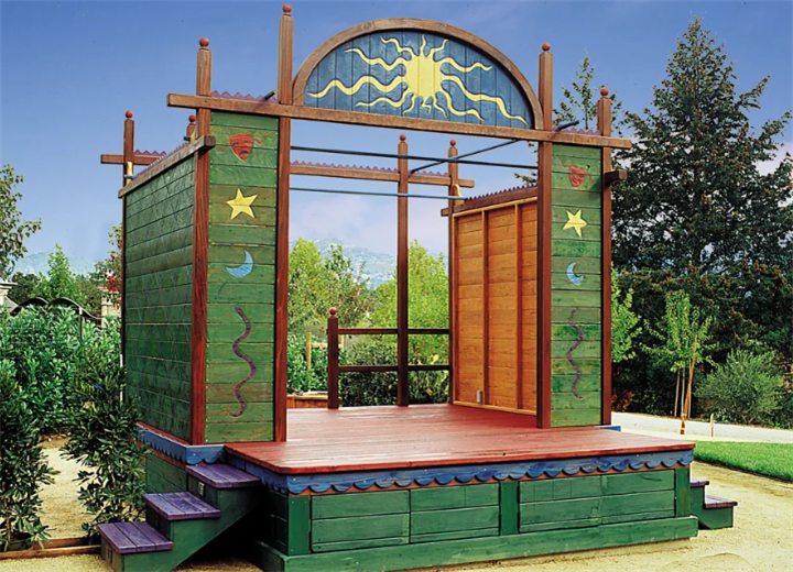 Hand-painted wooden outdoor play stage with sun and star decorations for backyard performances