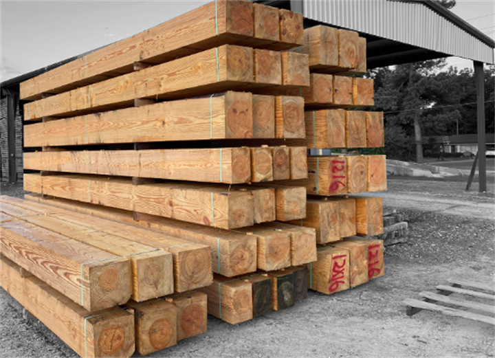 Uniform precision-cut Western Red Cedar structural beams stacked at a Pacific Northwest local sawmill